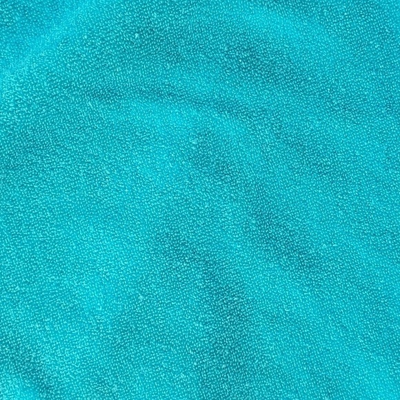 Turquise TERRYCLOTH mini skirt with white trim.  Ties at waist.  Size is 19 XXL - Picture 3 of 6